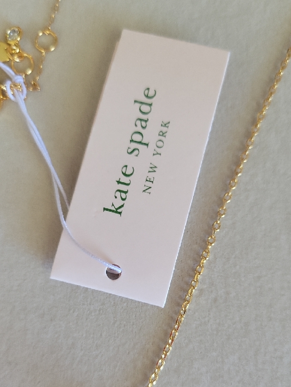 Kate Spade Gold Chain Necklace with Daisy, Yellow Car & 'Girls Trip' Charm - Picture 8 of 8